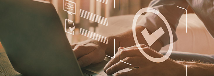 IPS customer processing invoice payments on laptop